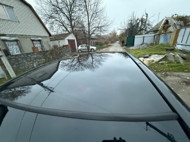 Черный Опель Астра, объемом двигателя 1.6 л и пробегом 250 тыс. км за 3750 $, фото 14 на Automoto.ua