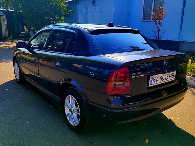Черный Опель Астра, объемом двигателя 1.4 л и пробегом 141 тыс. км за 3500 $, фото 2 на Automoto.ua