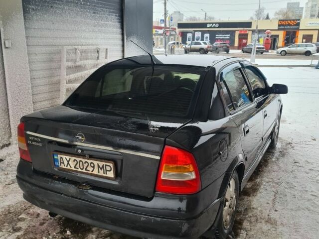 Черный Опель Астра, объемом двигателя 1.6 л и пробегом 254 тыс. км за 2400 $, фото 3 на Automoto.ua