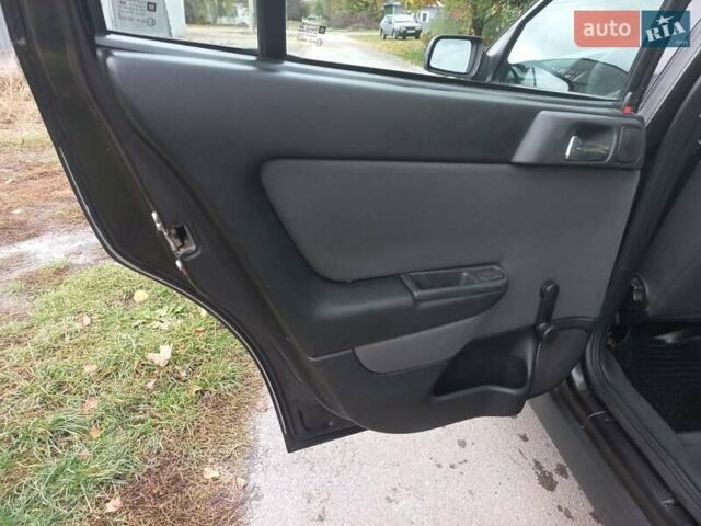 Черный Опель Астра, объемом двигателя 1.4 л и пробегом 220 тыс. км за 4500 $, фото 17 на Automoto.ua