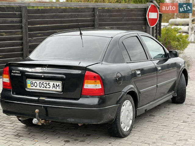 Черный Опель Астра, объемом двигателя 1.4 л и пробегом 157 тыс. км за 2500 $, фото 17 на Automoto.ua
