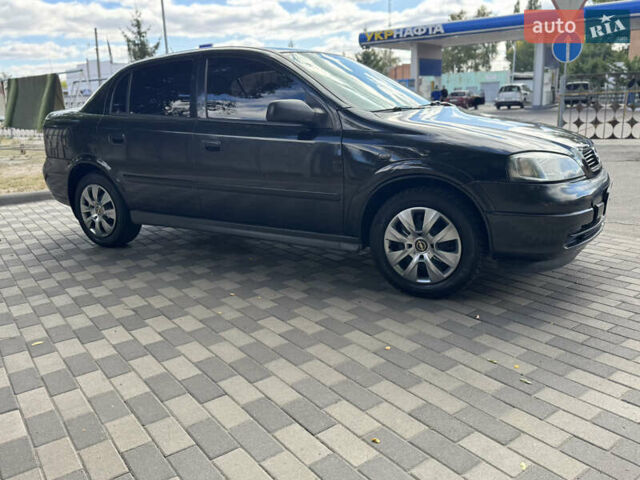 Чорний Опель Астра, об'ємом двигуна 1.36 л та пробігом 265 тис. км за 2999 $, фото 4 на Automoto.ua