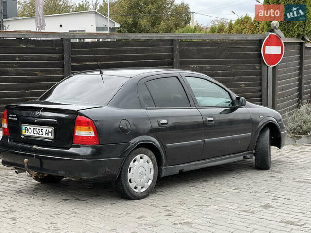 Черный Опель Астра, объемом двигателя 1.4 л и пробегом 157 тыс. км за 2500 $, фото 20 на Automoto.ua
