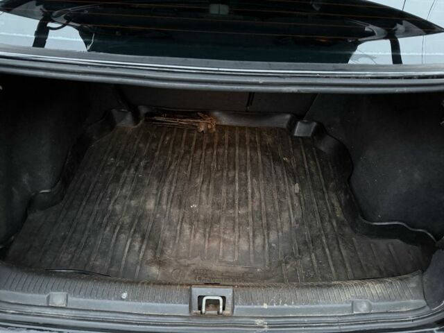 Черный Опель Астра, объемом двигателя 1.6 л и пробегом 250 тыс. км за 3750 $, фото 21 на Automoto.ua