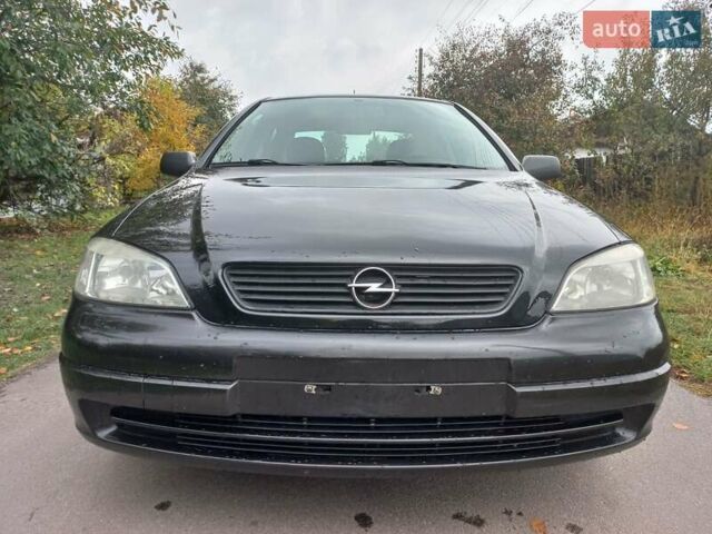 Черный Опель Астра, объемом двигателя 1.4 л и пробегом 220 тыс. км за 4500 $, фото 7 на Automoto.ua