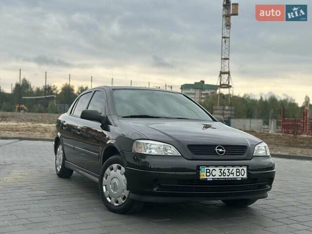 Черный Опель Астра, объемом двигателя 1.4 л и пробегом 216 тыс. км за 3999 $, фото 1 на Automoto.ua