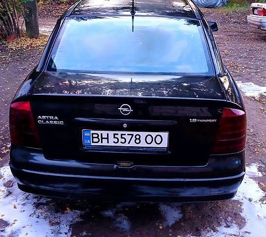 Черный Опель Астра, объемом двигателя 1.6 л и пробегом 256 тыс. км за 3300 $, фото 2 на Automoto.ua