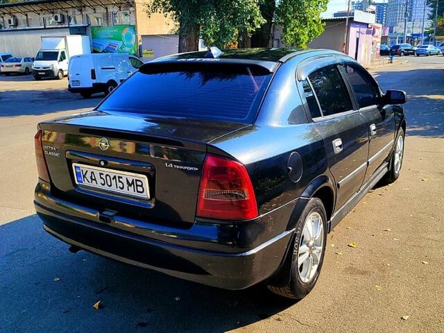 Черный Опель Астра, объемом двигателя 1.4 л и пробегом 141 тыс. км за 3500 $, фото 3 на Automoto.ua