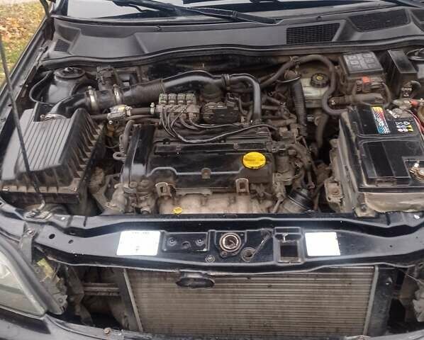 Черный Опель Астра, объемом двигателя 1.4 л и пробегом 340 тыс. км за 4100 $, фото 11 на Automoto.ua