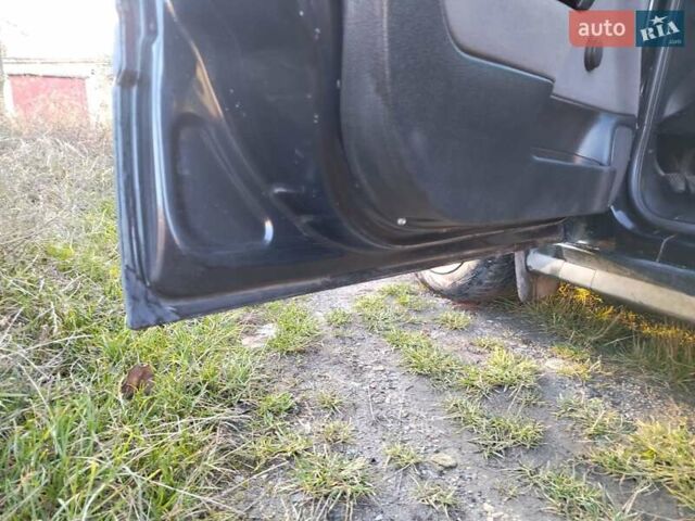 Чорний Опель Астра, об'ємом двигуна 1.4 л та пробігом 250 тис. км за 3200 $, фото 18 на Automoto.ua