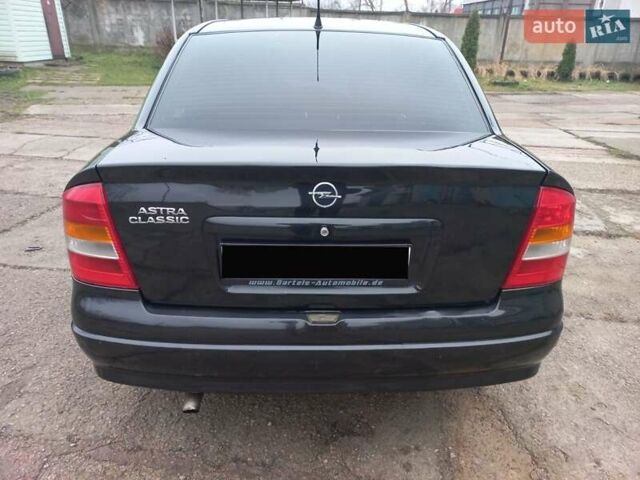 Черный Опель Астра, объемом двигателя 1.4 л и пробегом 230 тыс. км за 4500 $, фото 6 на Automoto.ua