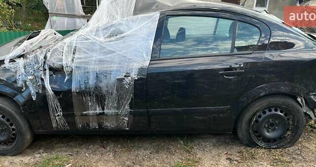 Черный Опель Астра, объемом двигателя 1.8 л и пробегом 140 тыс. км за 1500 $, фото 2 на Automoto.ua