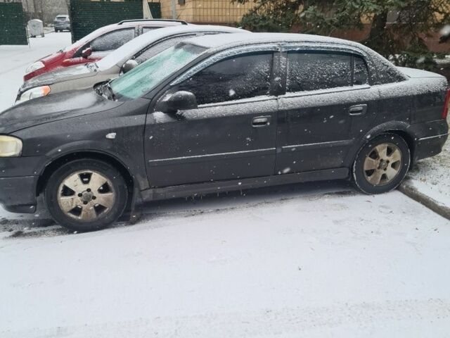 Черный Опель Астра, объемом двигателя 1.6 л и пробегом 254 тыс. км за 2400 $, фото 6 на Automoto.ua