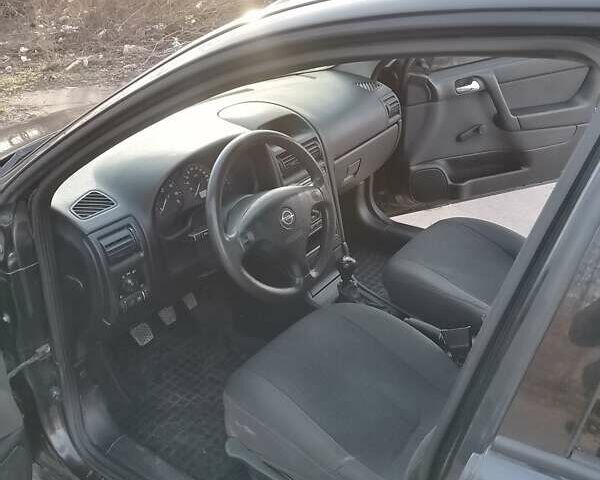 Чорний Опель Астра, об'ємом двигуна 1.4 л та пробігом 160 тис. км за 3100 $, фото 11 на Automoto.ua