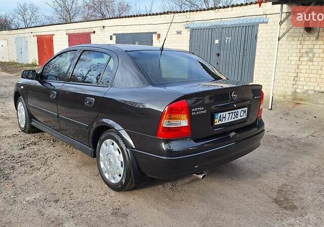 Чорний Опель Астра, об'ємом двигуна 1.6 л та пробігом 52 тис. км за 5600 $, фото 2 на Automoto.ua