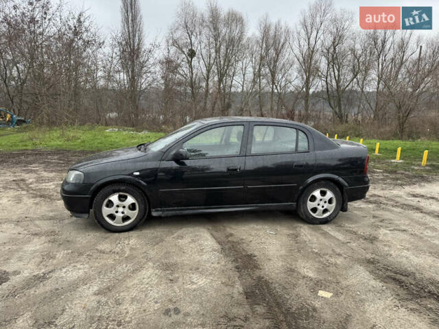 Черный Опель Астра, объемом двигателя 1.7 л и пробегом 300 тыс. км за 2999 $, фото 12 на Automoto.ua