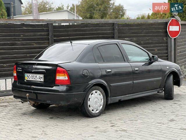 Черный Опель Астра, объемом двигателя 1.4 л и пробегом 157 тыс. км за 2500 $, фото 18 на Automoto.ua
