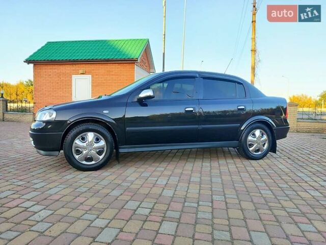 Чорний Опель Астра, об'ємом двигуна 1.4 л та пробігом 90 тис. км за 5200 $, фото 10 на Automoto.ua