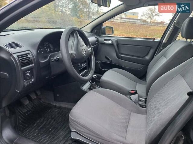 Черный Опель Астра, объемом двигателя 1.4 л и пробегом 230 тыс. км за 4500 $, фото 8 на Automoto.ua