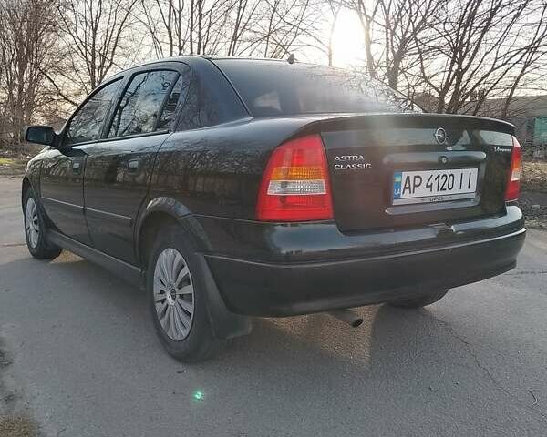 Чорний Опель Астра, об'ємом двигуна 1.4 л та пробігом 160 тис. км за 3100 $, фото 6 на Automoto.ua