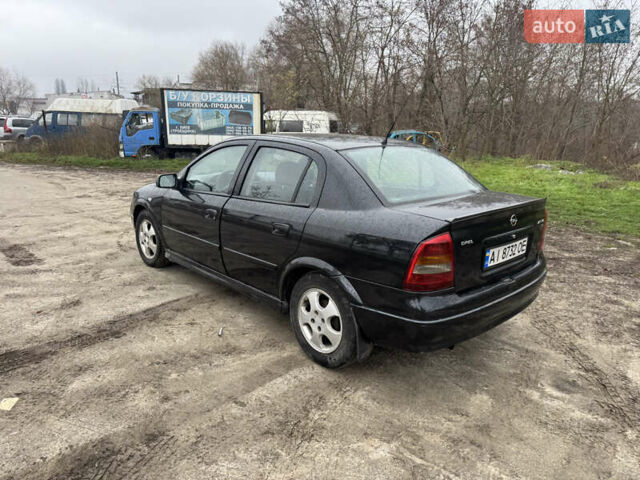 Черный Опель Астра, объемом двигателя 1.7 л и пробегом 300 тыс. км за 2999 $, фото 10 на Automoto.ua