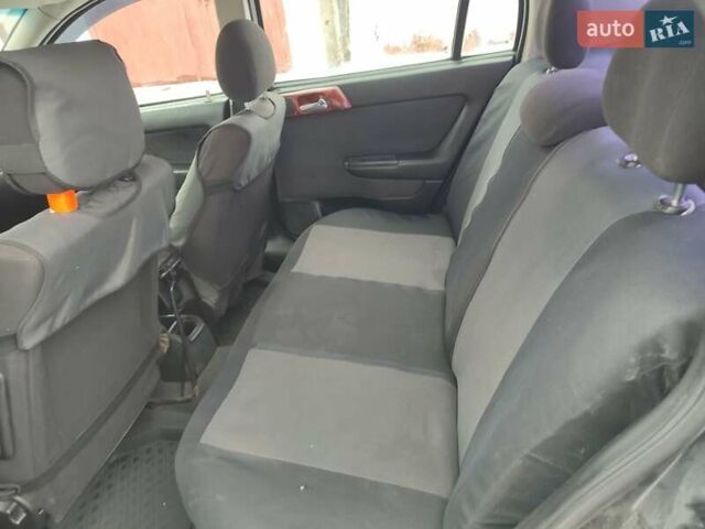 Черный Опель Астра, объемом двигателя 1.36 л и пробегом 300 тыс. км за 2150 $, фото 8 на Automoto.ua