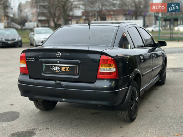 Черный Опель Астра, объемом двигателя 1.4 л и пробегом 102 тыс. км за 3600 $, фото 13 на Automoto.ua