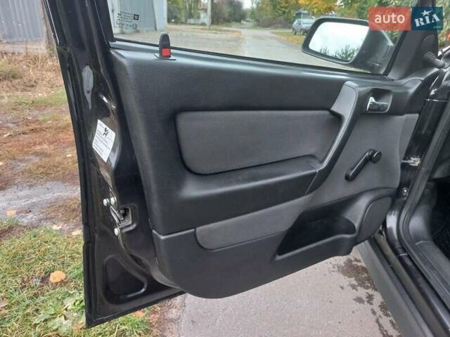 Черный Опель Астра, объемом двигателя 1.4 л и пробегом 220 тыс. км за 4500 $, фото 14 на Automoto.ua