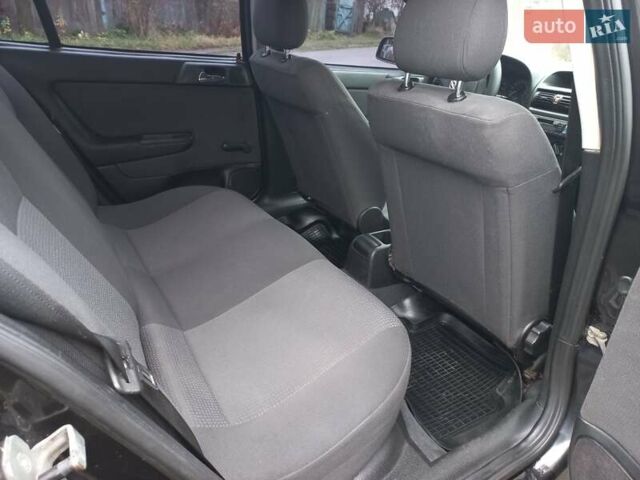 Чорний Опель Астра, об'ємом двигуна 1.4 л та пробігом 225 тис. км за 4350 $, фото 12 на Automoto.ua