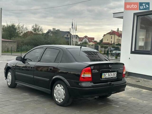 Черный Опель Астра, объемом двигателя 1.4 л и пробегом 216 тыс. км за 3999 $, фото 8 на Automoto.ua