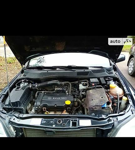 Черный Опель Астра, объемом двигателя 1.4 л и пробегом 155 тыс. км за 3500 $, фото 7 на Automoto.ua