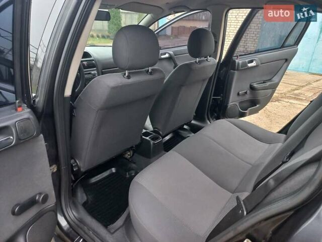 Черный Опель Астра, объемом двигателя 1.4 л и пробегом 230 тыс. км за 4500 $, фото 16 на Automoto.ua