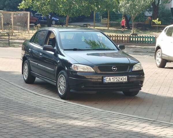 Черный Опель Астра, объемом двигателя 0 л и пробегом 177 тыс. км за 5400 $, фото 12 на Automoto.ua