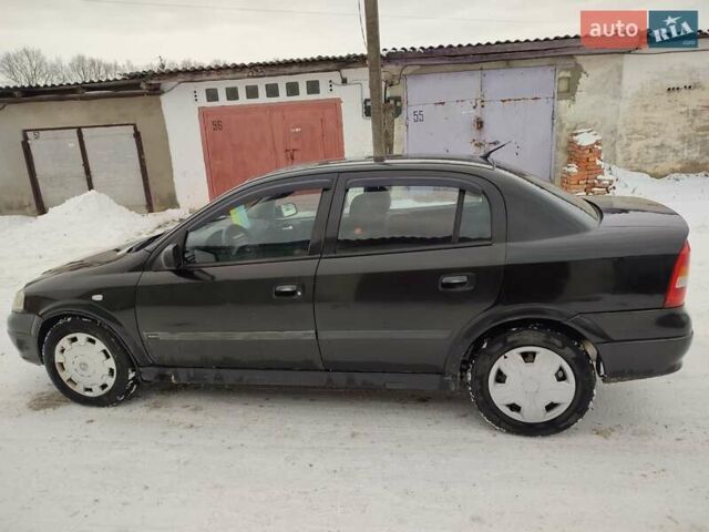 Черный Опель Астра, объемом двигателя 1.36 л и пробегом 300 тыс. км за 2150 $, фото 6 на Automoto.ua