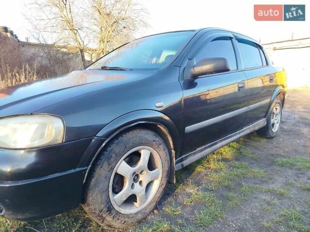 Чорний Опель Астра, об'ємом двигуна 1.4 л та пробігом 250 тис. км за 3200 $, фото 8 на Automoto.ua