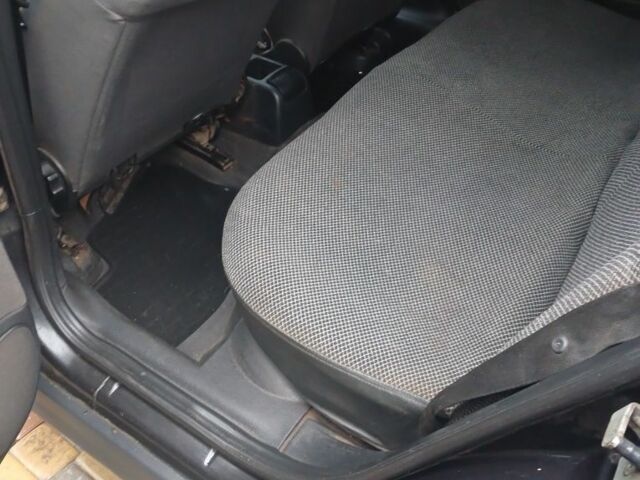 Черный Опель Астра, объемом двигателя 1.4 л и пробегом 362 тыс. км за 2600 $, фото 7 на Automoto.ua