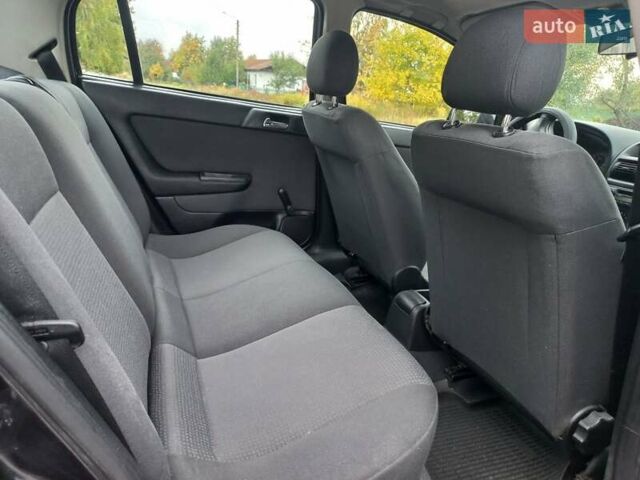 Черный Опель Астра, объемом двигателя 1.4 л и пробегом 230 тыс. км за 4500 $, фото 10 на Automoto.ua