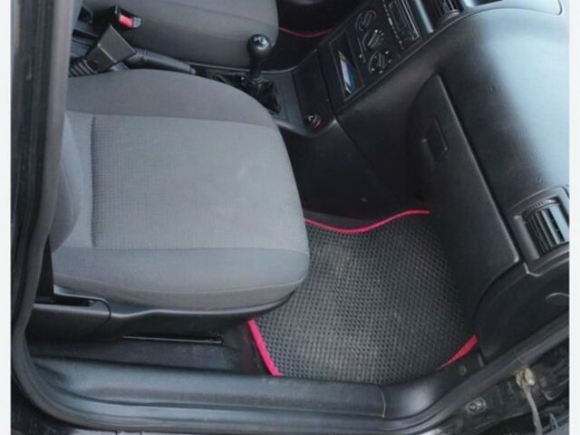 Черный Опель Астра, объемом двигателя 1.4 л и пробегом 176 тыс. км за 3850 $, фото 5 на Automoto.ua