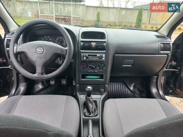 Черный Опель Астра, объемом двигателя 1.4 л и пробегом 230 тыс. км за 4500 $, фото 12 на Automoto.ua