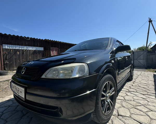 Черный Опель Астра, объемом двигателя 1.6 л и пробегом 262 тыс. км за 4500 $, фото 1 на Automoto.ua
