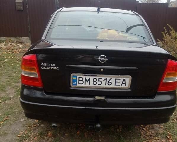 Черный Опель Астра, объемом двигателя 1.4 л и пробегом 340 тыс. км за 4100 $, фото 3 на Automoto.ua