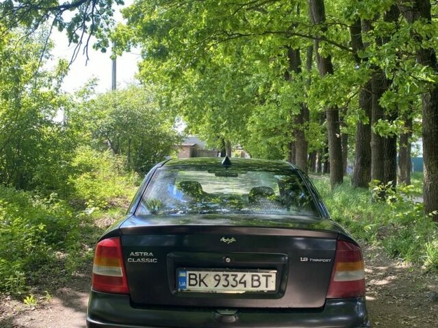 Черный Опель Астра, объемом двигателя 1.6 л и пробегом 470 тыс. км за 3000 $, фото 4 на Automoto.ua