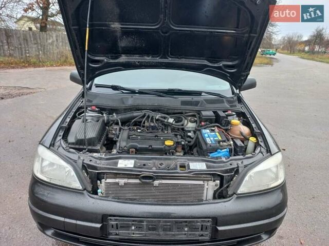 Чорний Опель Астра, об'ємом двигуна 1.4 л та пробігом 225 тис. км за 4350 $, фото 7 на Automoto.ua