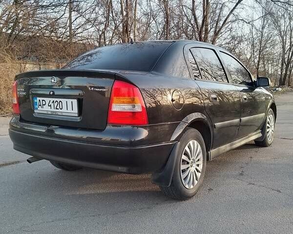 Чорний Опель Астра, об'ємом двигуна 1.4 л та пробігом 160 тис. км за 3100 $, фото 8 на Automoto.ua