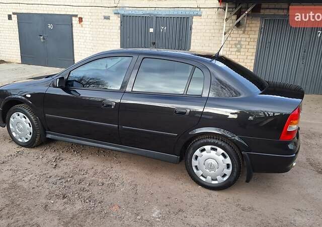 Чорний Опель Астра, об'ємом двигуна 1.6 л та пробігом 52 тис. км за 5600 $, фото 16 на Automoto.ua