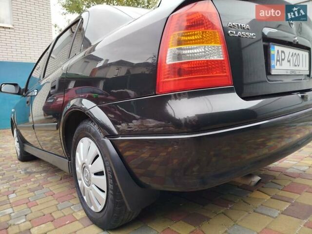 Черный Опель Астра, объемом двигателя 1.36 л и пробегом 160 тыс. км за 3850 $, фото 12 на Automoto.ua