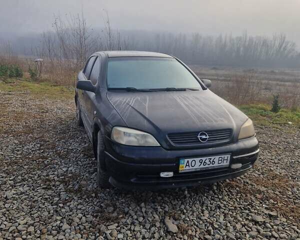 Черный Опель Астра, объемом двигателя 1.39 л и пробегом 180 тыс. км за 2550 $, фото 4 на Automoto.ua