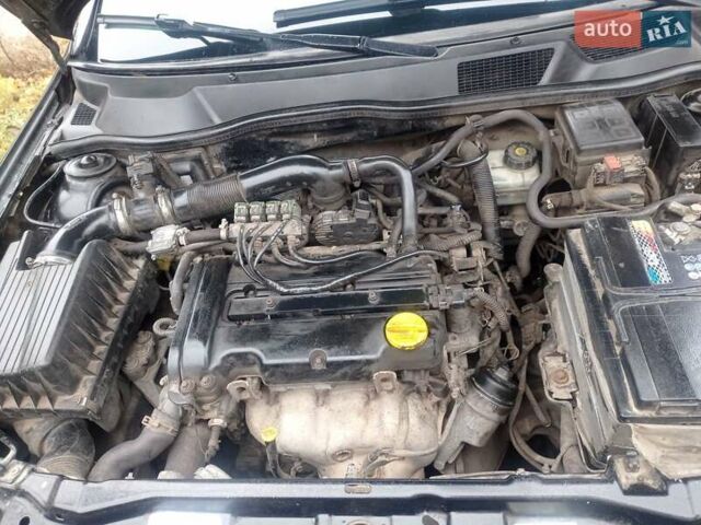 Черный Опель Астра, объемом двигателя 1.4 л и пробегом 340 тыс. км за 4100 $, фото 10 на Automoto.ua