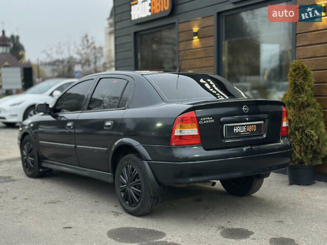 Черный Опель Астра, объемом двигателя 1.4 л и пробегом 102 тыс. км за 3600 $, фото 8 на Automoto.ua