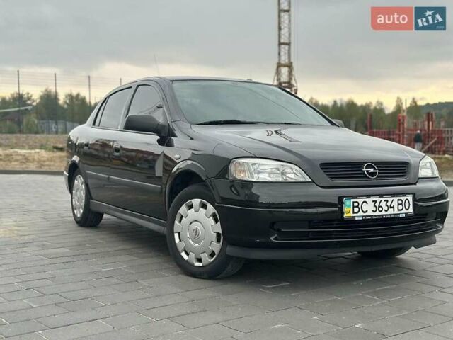 Черный Опель Астра, объемом двигателя 1.4 л и пробегом 216 тыс. км за 3999 $, фото 29 на Automoto.ua